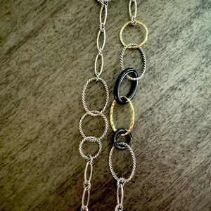 David Yurman necklace that is 20” w gold, silver and black onyx
